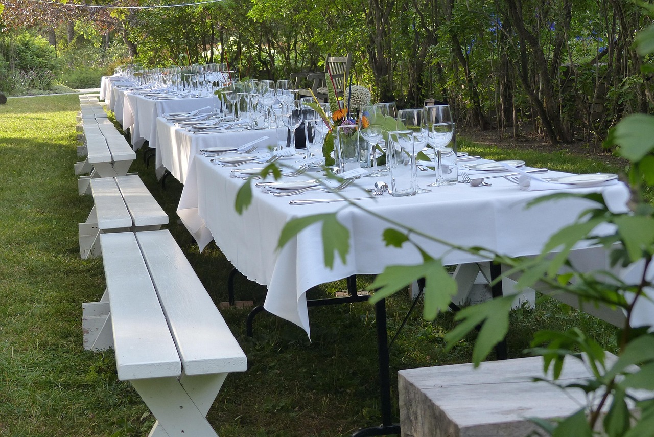 An outdoor table decorated for a celebration